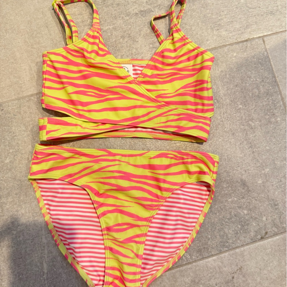 Vibrant Zebra reversible girls treasure and bond Bikini Set in Pink and Yellow.